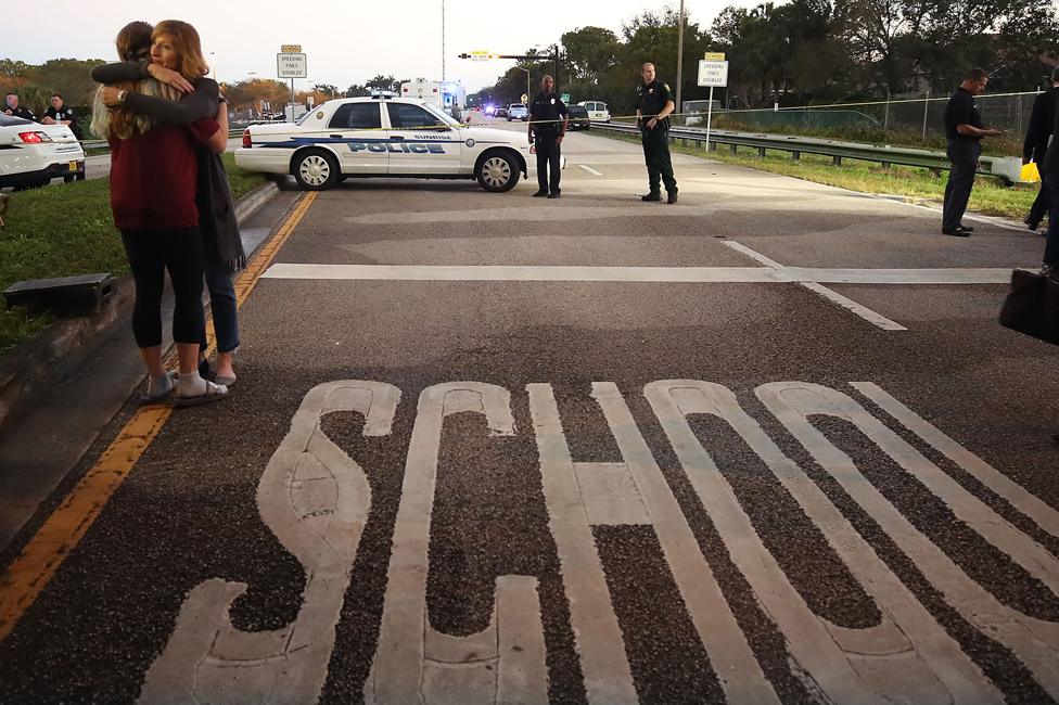 Police seal off the Marjory Stoneman Douglas High School