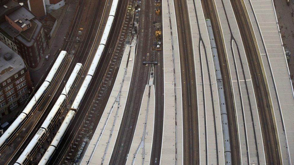 Trains travelling past the platforms of London Bridge station