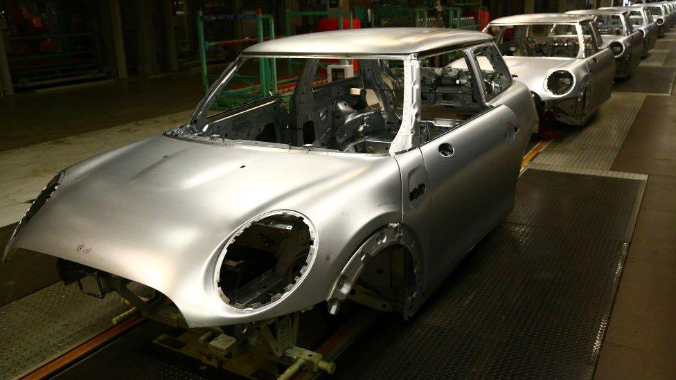 A Mini on the assembly line at the BMW factory in Oxford