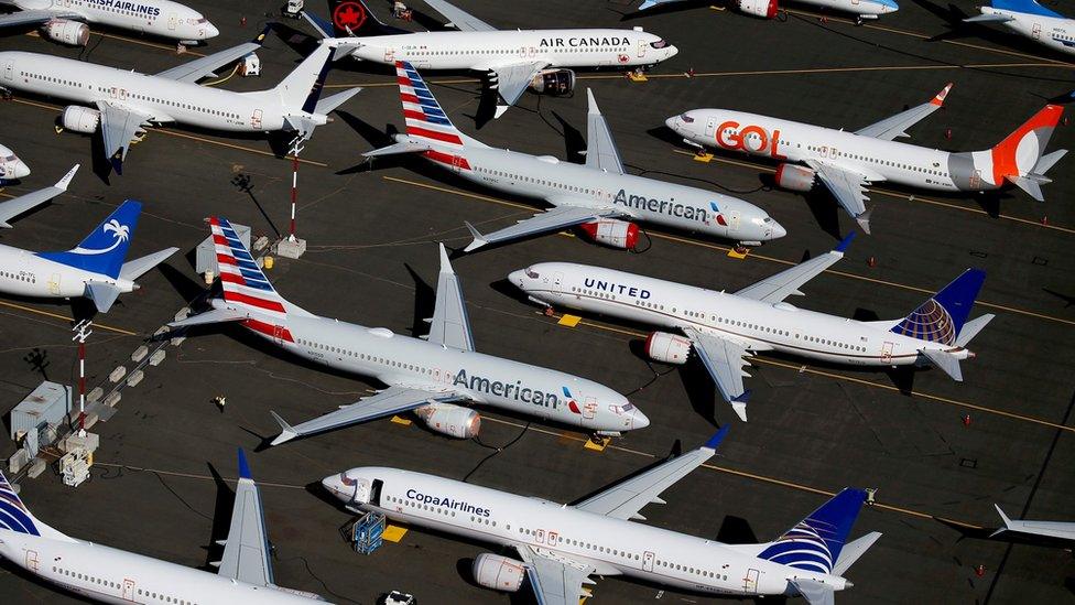 rounded Boeing 737 MAX aircraft are seen parked in an aerial photo at Boeing Field in Seattle on 1 July, 2019.