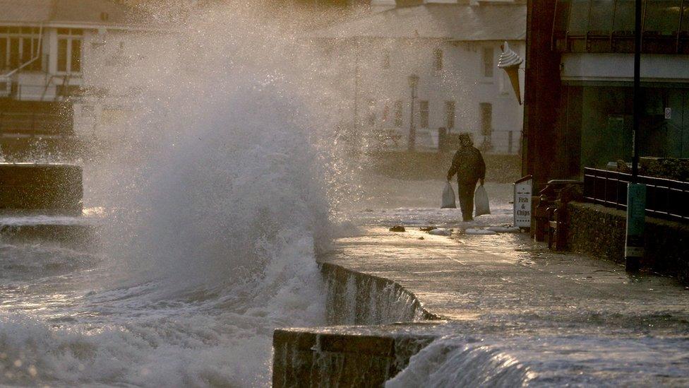 Waves crash along the coast at Swanage in Dorset