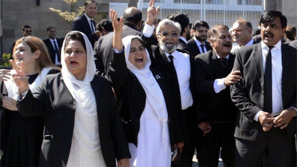 Lawyers, supporters of former three-time prime minister Nawaz Sharif, react after the Islamabad High Court granted protective bail to Sharif, in Islamabad, Pakistan, 19 October 2023.