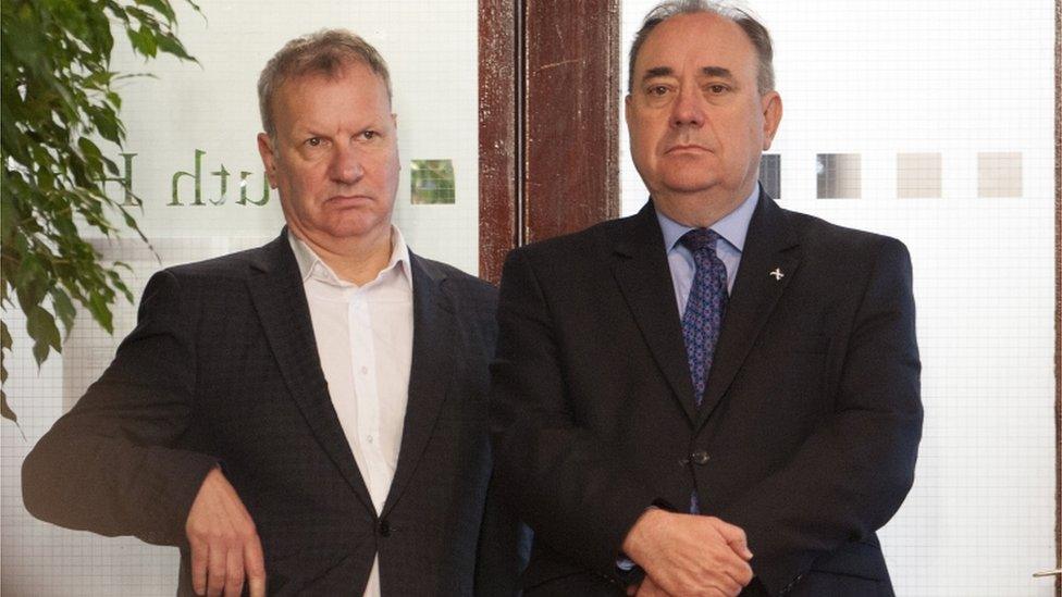 SNP MPs Pete Wishart and Alex Salmond watch Nicola Sturgeon's speech