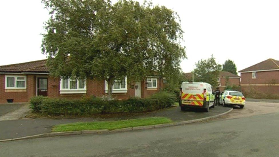 Police outside a bungalow on Elizabeth Road, in Fleckney, Leicestershire