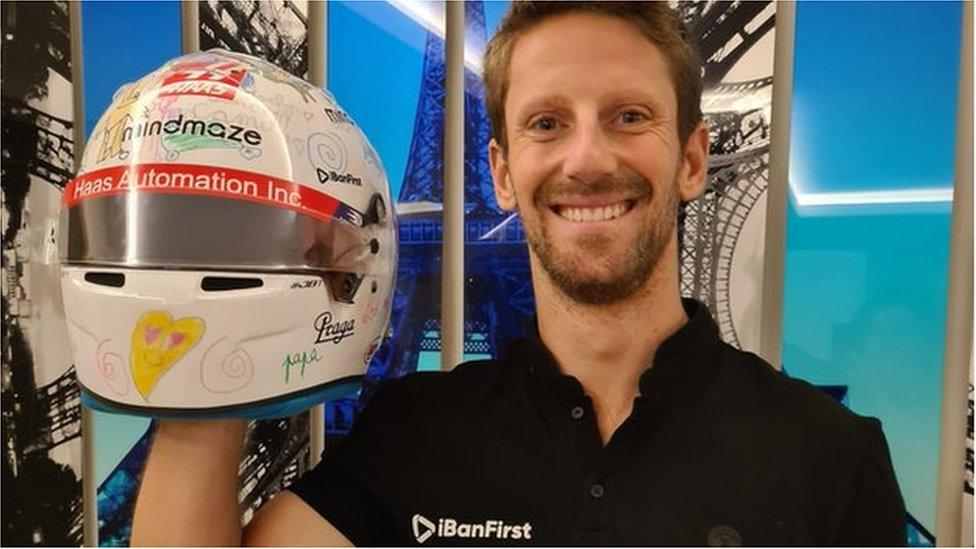 Romain with his helmet