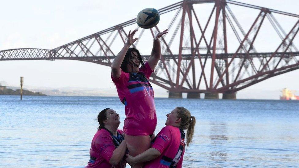 People swimming in South Queensferry, Scotland