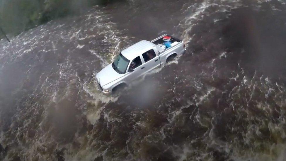 Emergency crews have rescued more than 900 people in North Carolina as floodwaters continue to rise.