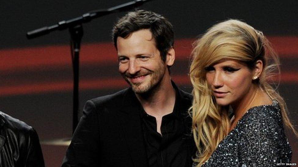 Kesha and Dr Luke collect an award together in 2011