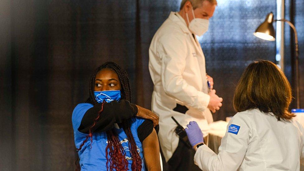 A group of teenagers serving as 'Covid-19 Student Ambassadors' joined Governor Gretchen Whitmer to receive a dose of the Pfizer Covid vaccine at Ford Field during an event to promote and encourage Michigan residents to go and get their vaccines on April 6, 2021 in Detroit, Michigan