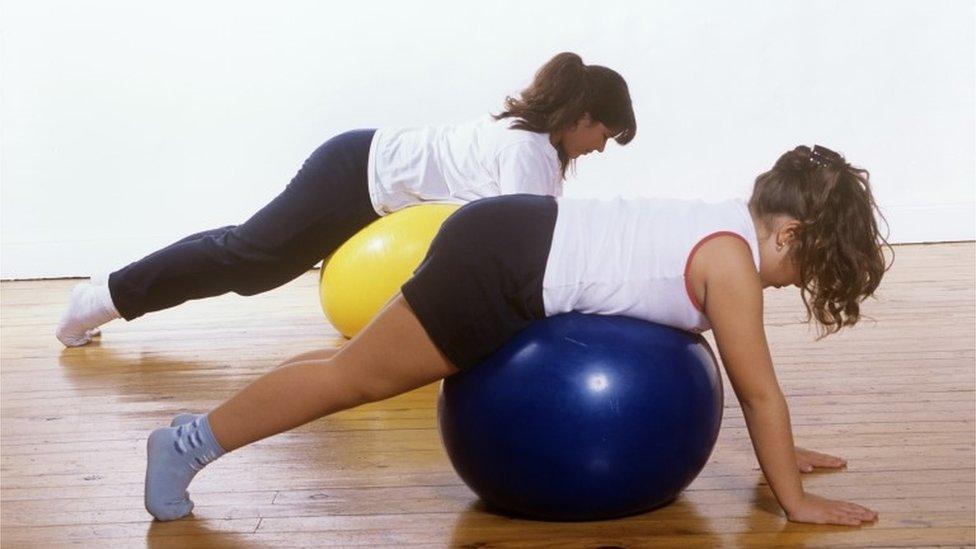 girls exercising on fitness balls