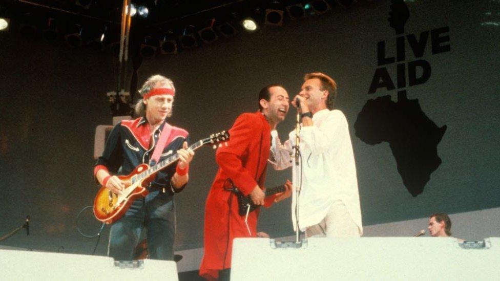 Mark Knopfler (left)