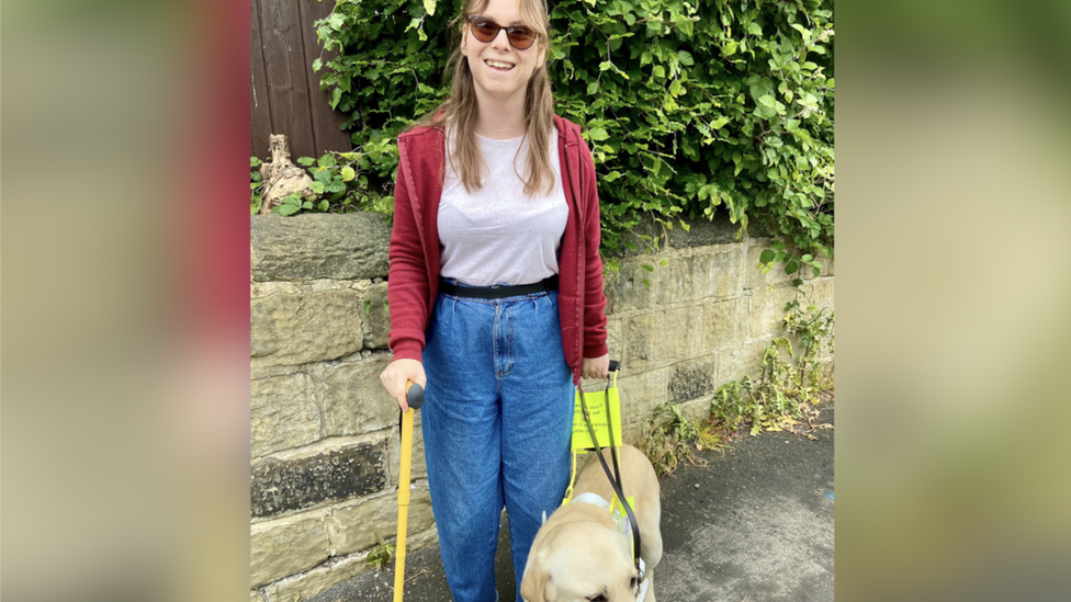 Chloe Tear with guide dog Dezzie