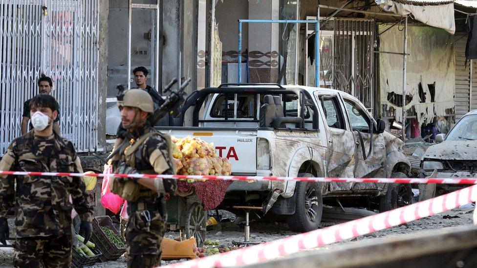 Afghan security officials inspect the scene of a suicide bomb attack targeting Shiite Muslims Mosque during Friday congregational prayers in Kabul, Afghanistan, 29 September 2017