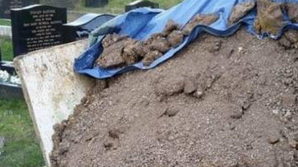 Rubble on grave