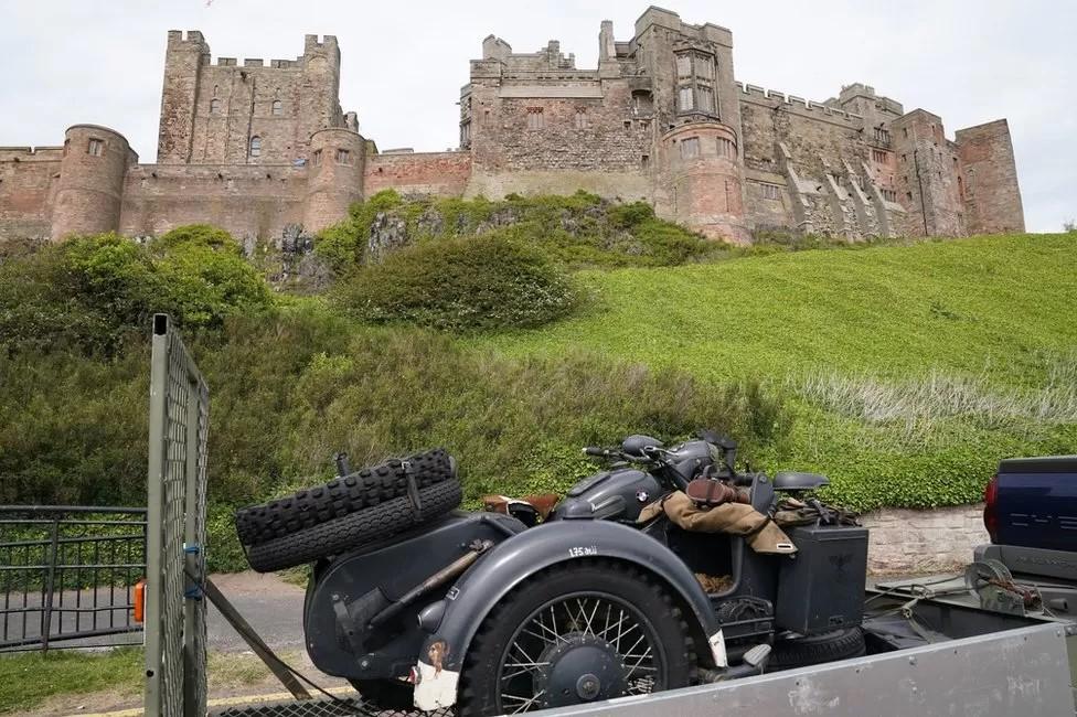 Bamburgh Castle with an armoured vehicle used on the film