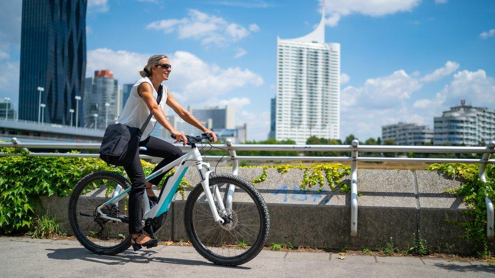 woman cycling in Austria