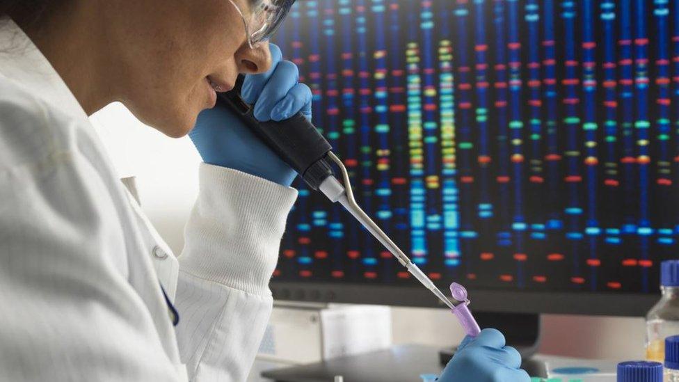 Woman testing in a lab