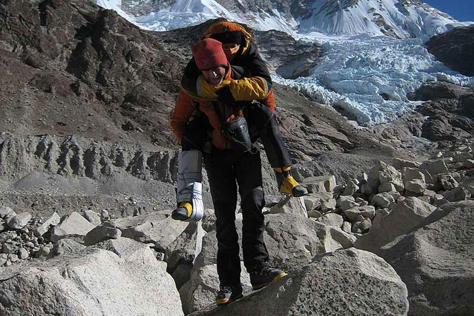 Luca Vuerich carrying Nives Meroi - he died in an avalanche two years later