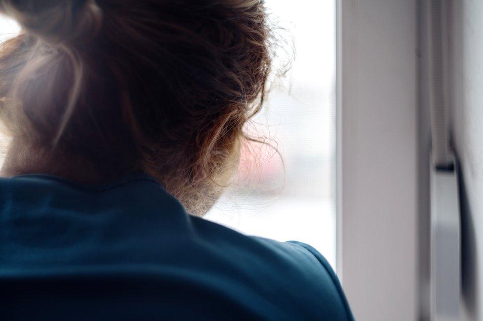 Woman at window