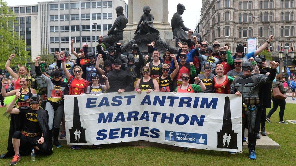 Runners dressed as Batman at the beginning of the Belfast marathon