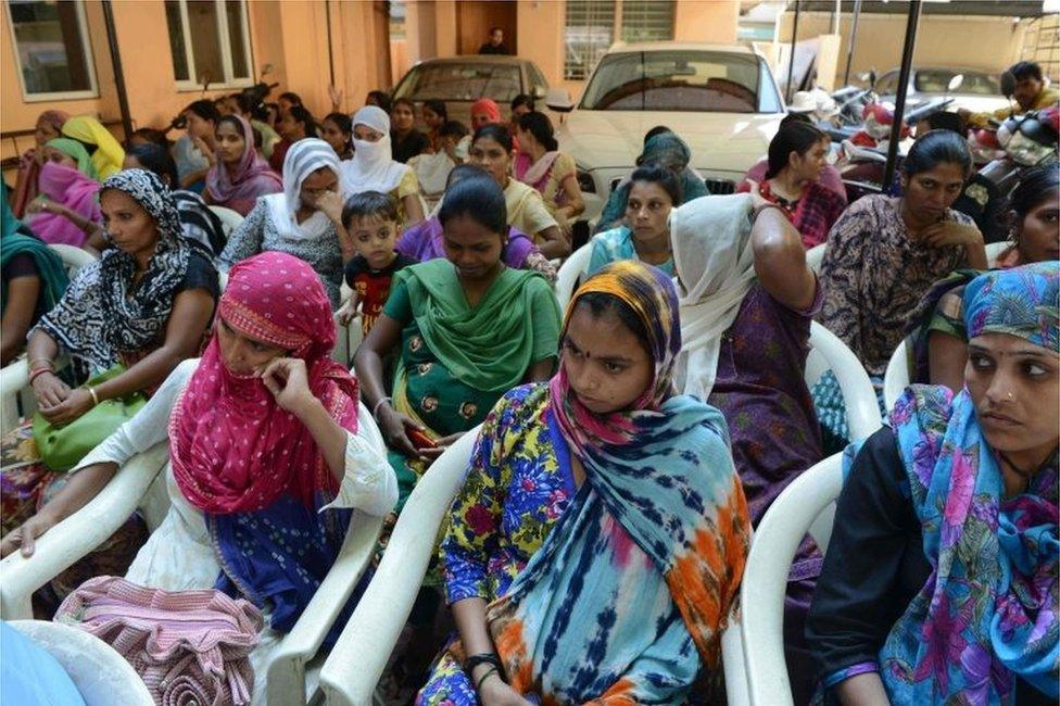 This file photograph taken on October 29, 2015, shows Indian surrogate mothers as they gather during a peaceful protest in the campus of Dr. Nayana Patel"s Kaival Hospital in Anand, some 90 kms from Ahmedabad.