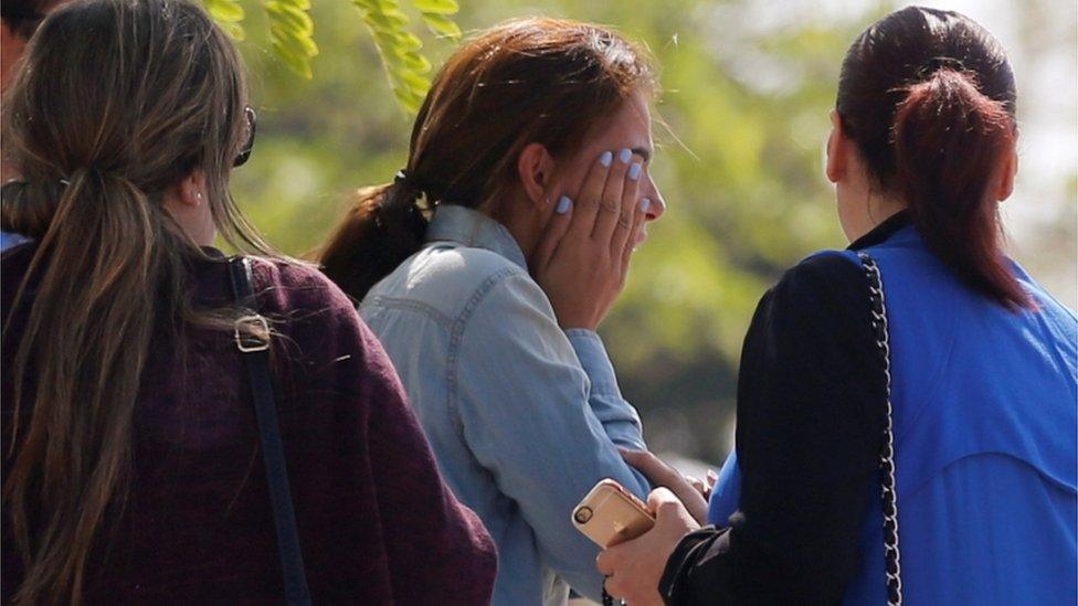 Unidentified relatives and friends of passengers at Cairo airport