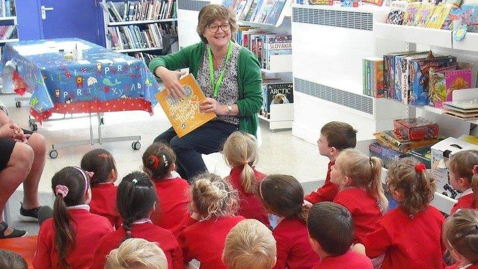 Children and staff in the Family Library