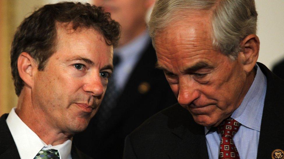 WASHINGTON - JUNE 22: U.S. Sen. Rand Paul (R-KY) (L) talks to his father Rep. Ron Paul (R-TX) (R) during a news conference June 22, 2011 on Capitol Hill in Washington, DC