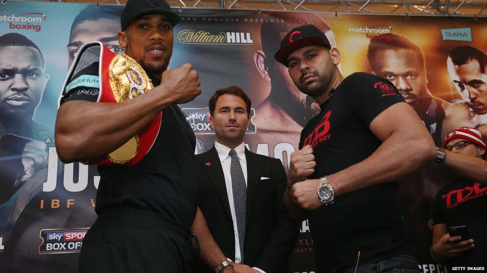 Anthony Joshua alongside Eric Molina