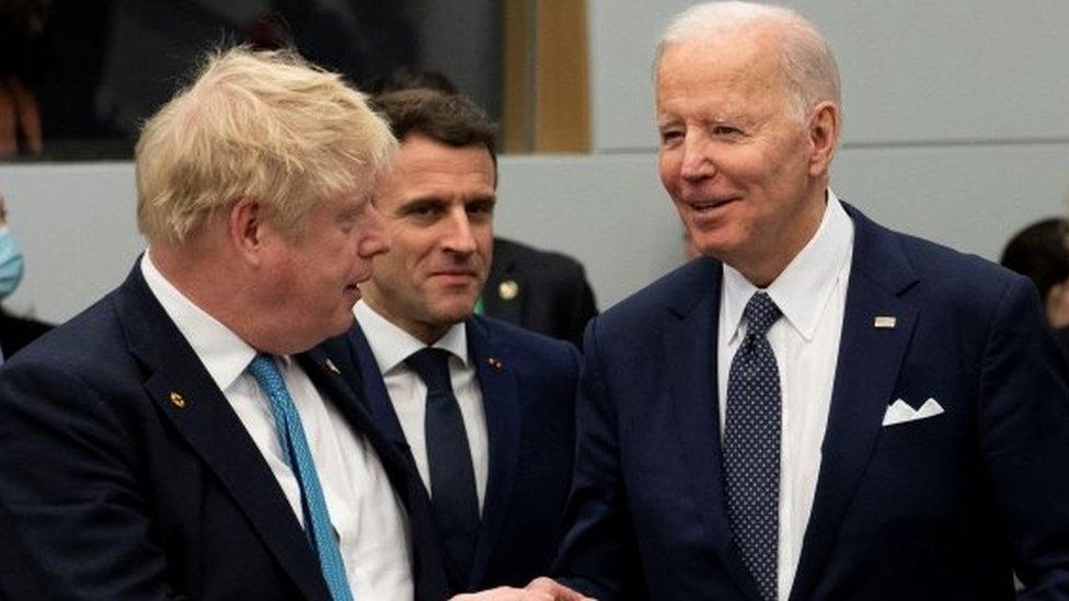 Boris Johnson, Emmanuel Macron and Joe Biden at a G7 summit in March