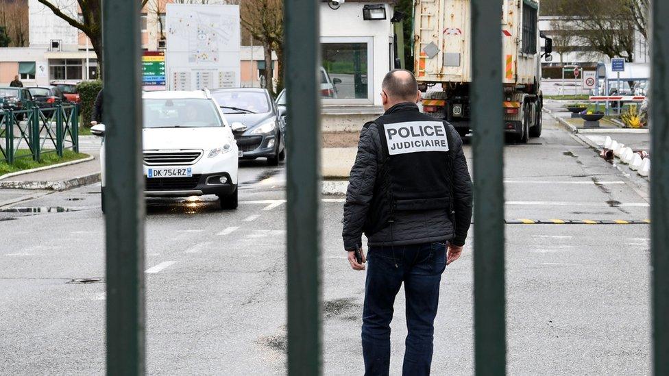 Police stand guard at entrance to 7th CBA de Reynies barracks