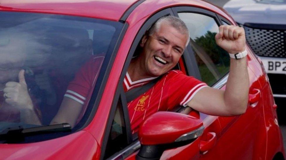 Liverpool supporters heading for the Champions League Final in Paris wait amongst freight and holiday traffic queues at the Port of Dover in Kent.