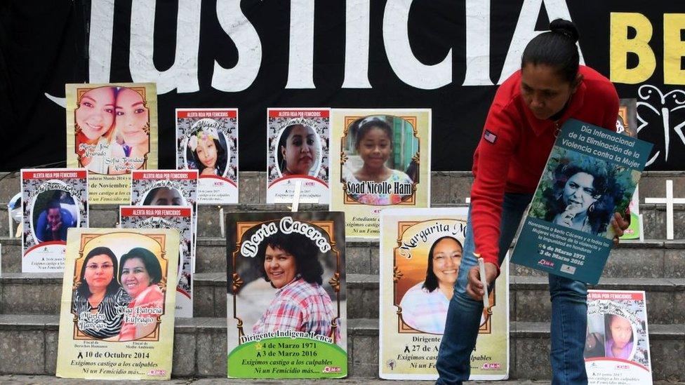 Pictures of women who have been killed, including well-known environmental activist Berta Caceres (centre)