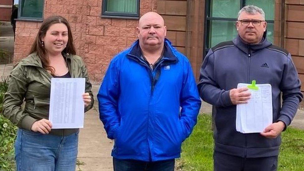 Gemma Dinsdale, Iain Thomason and Edwin Dinsdale delivering their petition to Copeland Council