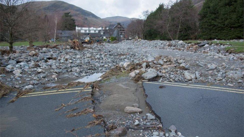 Rubble and stones are left on the shoreline of Ullswater Llake next to the village of Glenridding after flash floods in Penrith, 10 December 2015