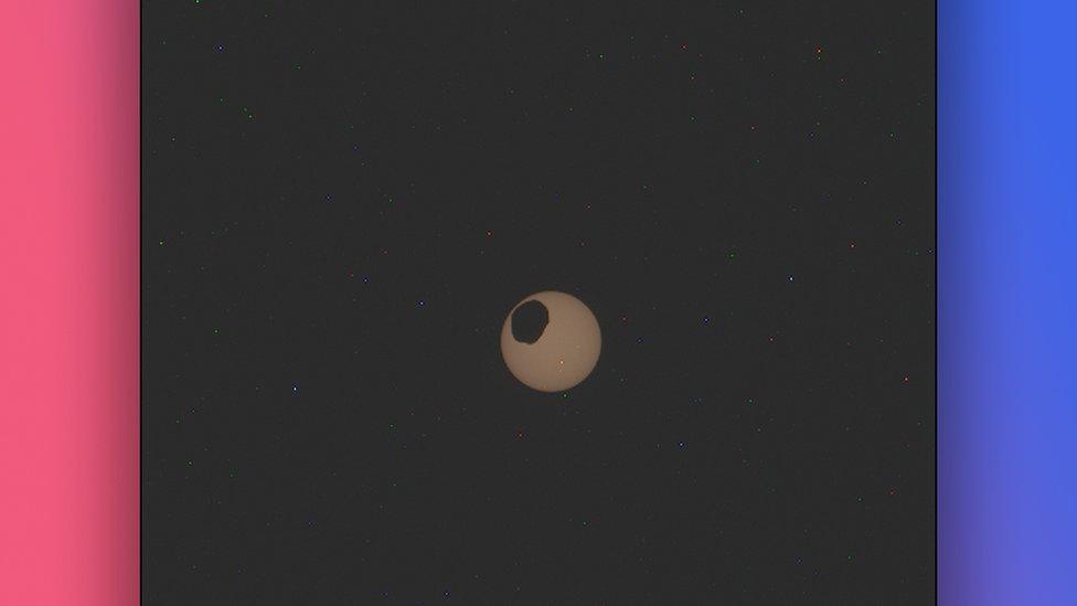 photo of the Sun with phobos passing across