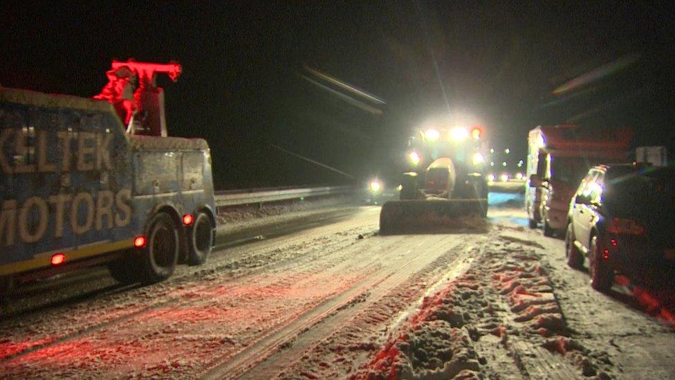 Snow being cleared from road