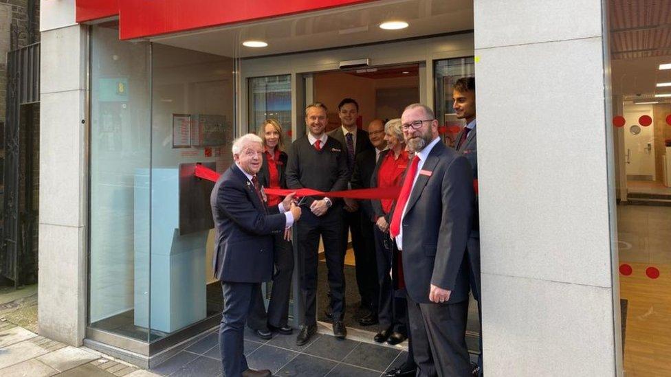 Graeme opening a bank branch