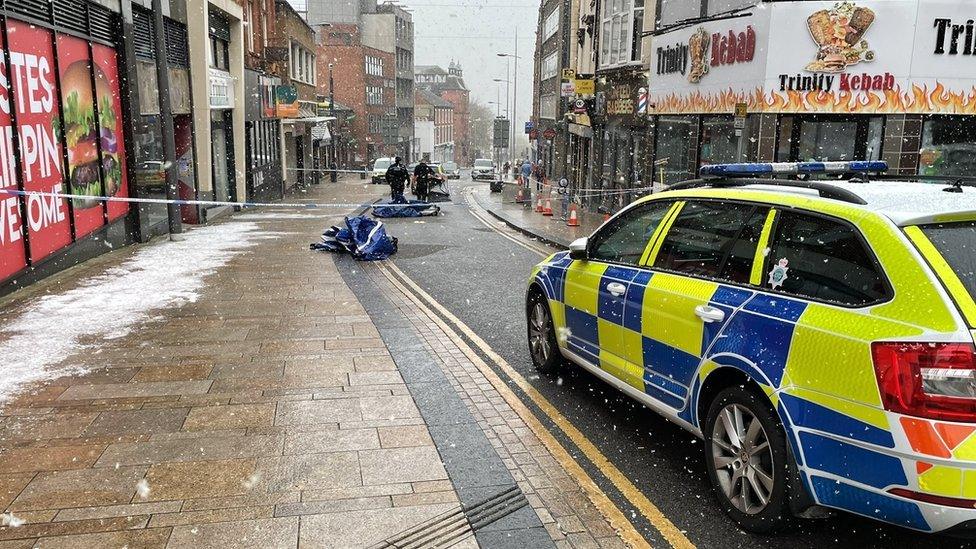 Police in Trinity Street on Sunday