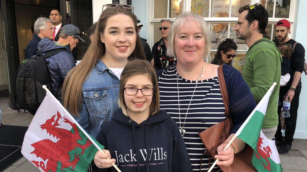 Picture: Royal fans in Windsor holding Welsh flags