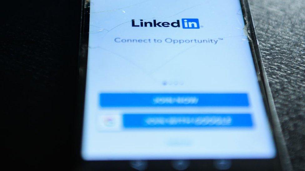 LinkedIn logo on mobile phone