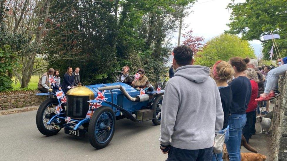 Classic car with spectators