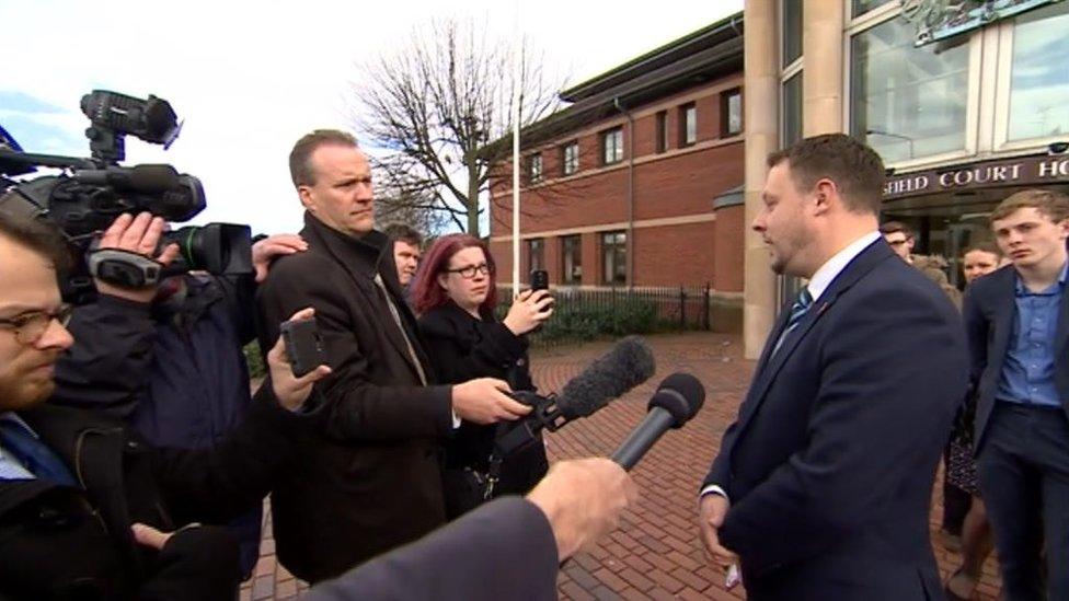 Jason Zadrozny speaking to journalists outside court