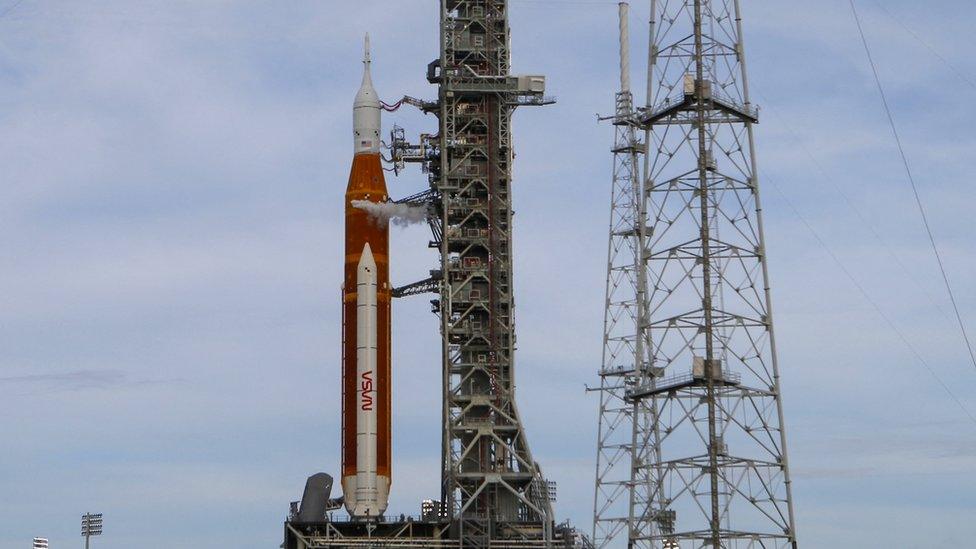 Nasa's next-generation moon rocket with its Orion crew capsule on top, is readied for launch of the Artemis I mission at Cape Canaveral, 29 August