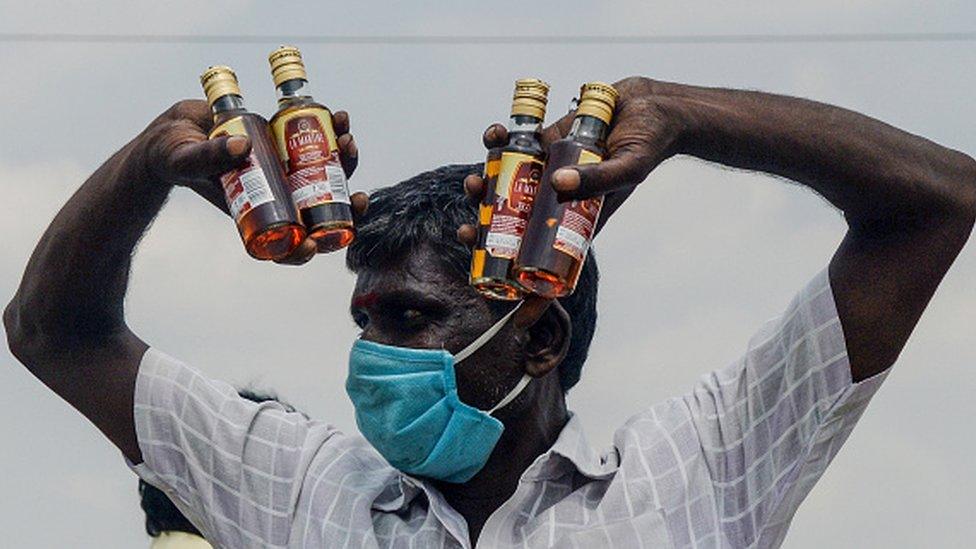 India liquor consumer after shops opened