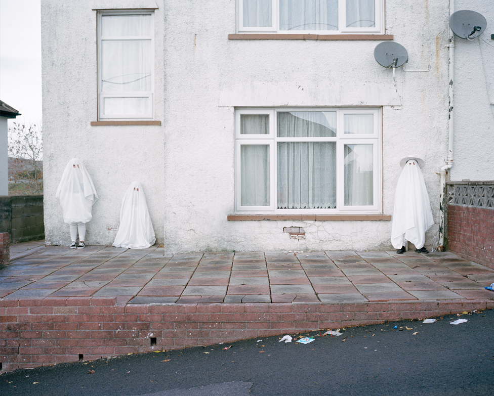 Children in white cloaks