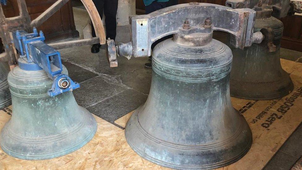 Bells on a church floor