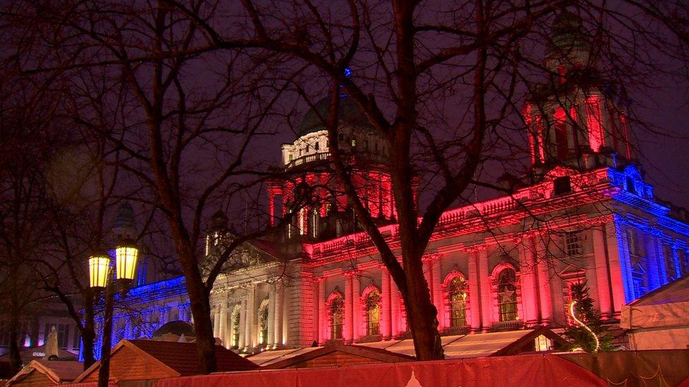 Belfast City Hall lit in the colours of the French national flag