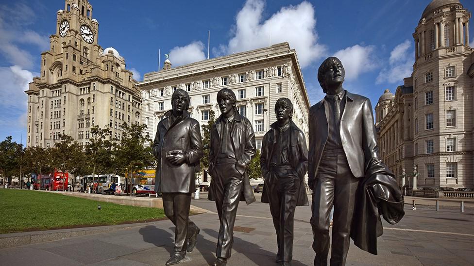 Beatles statue in front of the Royal Liver building in Liverpool