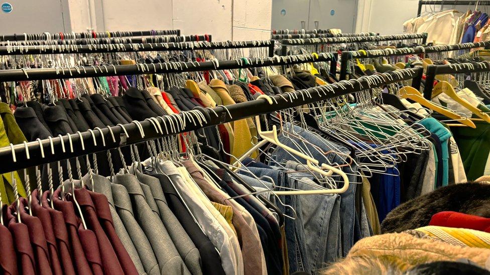 The clothing on racks